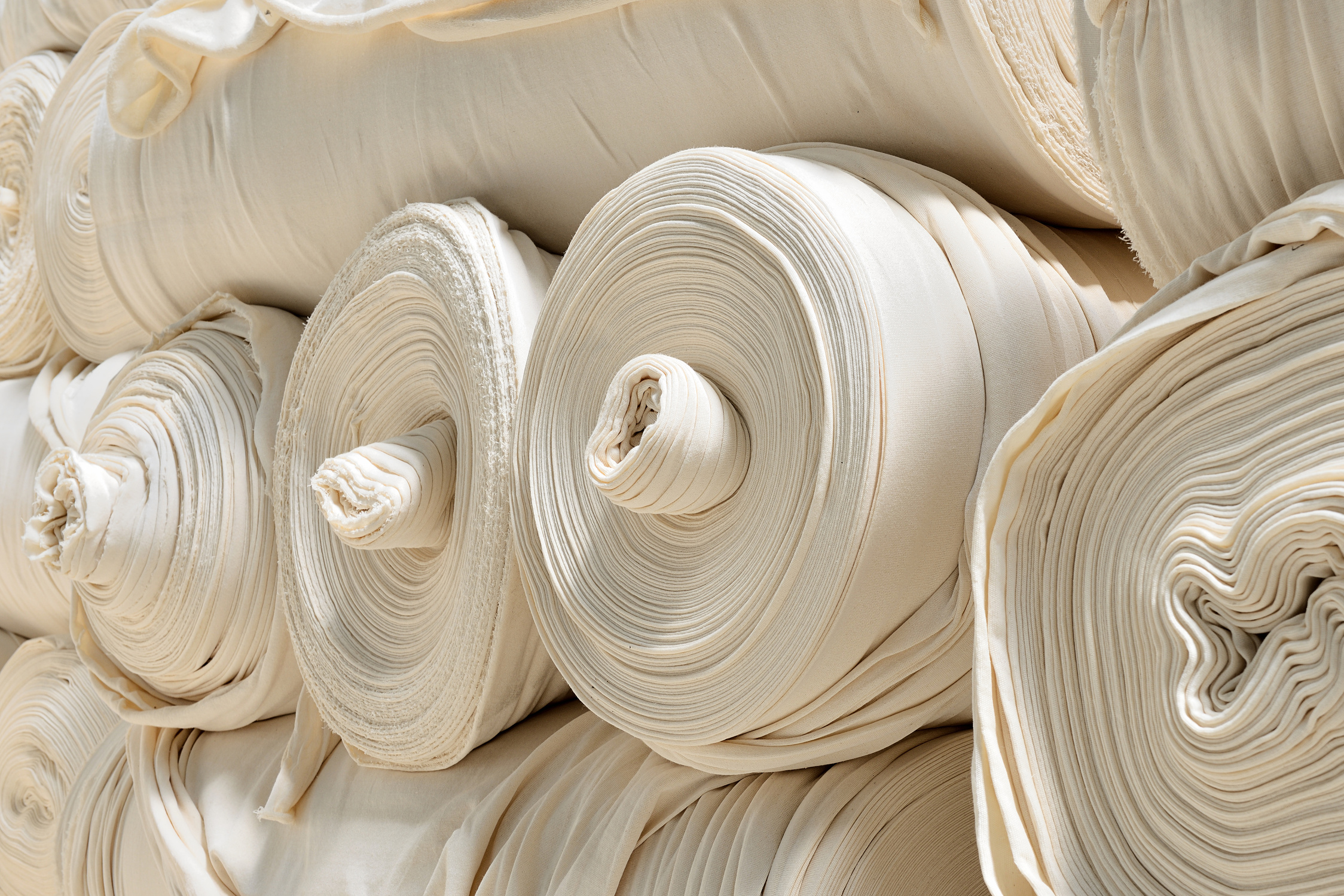 Stacked fabric rolls